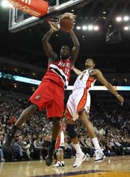 Greg Oden #52 of the Portland Trail Blazers dunks over Anthony Randolph #4 of the Golden State Warriors during an NBA game at Oracle Arena on November 20, 2009 in Oakland, California.  (Getty Images)